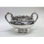A heavy Victorian silver two handled sugar bowl wi