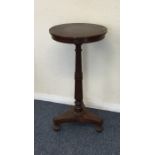 A Victorian rosewood pedestal occasional table. Es