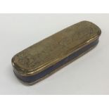 A Georgian oval brass mounted snuff box profusely