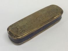 A Georgian oval brass mounted snuff box profusely