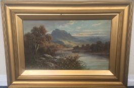 FRANK HIDER (British, 1861 - 1933): A gilt framed river lan
