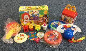 A Fisher Price McDonald's travelling box containin