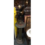 A tall fluted pedestal on stepped base. Approx. 78
