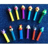 A selection of 'PEZ' dispensers in the form of mon