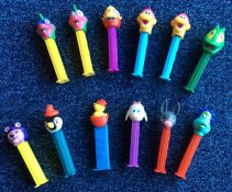 A selection of 'PEZ' dispensers in the form of mon
