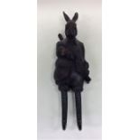 A novelty coat hanger in the form of a hare with t