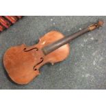 An old violin of typical form. Approx. 59 cms long