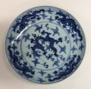 A blue and white Chinese circular shallow dish dec