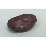 An Antique agate mounted hinged top snuff box. Est