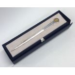 A cased silver paper knife. Approx. 50 grams. Est.