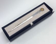 A cased silver paper knife. Approx. 50 grams. Est.