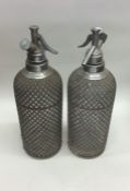 Two vintage soda syphons. Est. £15 - £20.