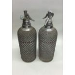 Two vintage soda syphons. Est. £15 - £20.