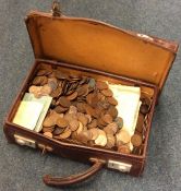 An old suitcase containing copper and other pennie