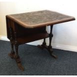 A carved Pembroke table on slender legs. Est. £40