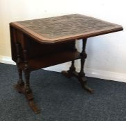 A carved Pembroke table on slender legs. Est. £40