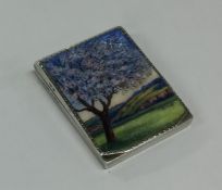 An attractively enamelled hinged top vesta case de