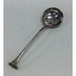 A Georgian silver onslow pattern ladle with crimpe