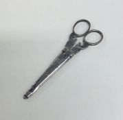 A pair of Georgian silver bright cut scissors in m