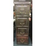 A rare retro metal four drawer filing cabinet. Est