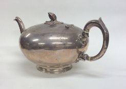 A good Victorian bullet shaped silver teapot with