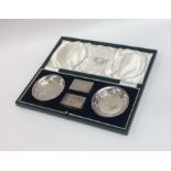 A good quality cased silver smoker's companion set