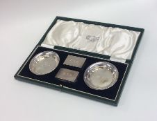 A good quality cased silver smoker's companion set