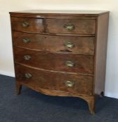 A Georgian mahogany bow front chest of five drawer