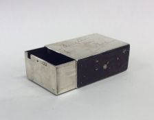 An unusual large silver match case in the form of