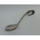 GEORG JENSEN: A good silver preserve spoon of typi