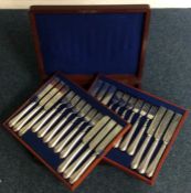 A mahogany cased set of 36 dessert knives and fork