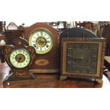 An inlaid mantle clock together with one other. Es