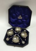 A cased set of four Victorian embossed salts toget