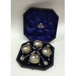 A cased set of four Victorian embossed salts toget