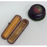 An amber and gold cheroot holder in fitted box, to