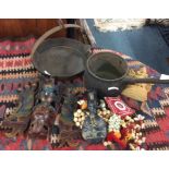 An old cast iron pan, beads etc.
