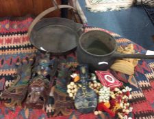 An old cast iron pan, beads etc.