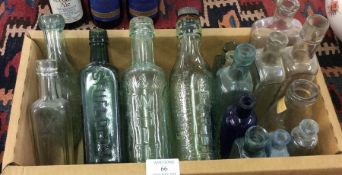 A collection of old glass bottles.