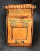 A satinwood coal box.