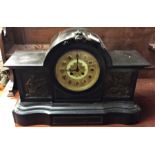 An old slate mantle clock.