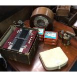 Two brass blowlamps, jigsaw puzzles, a mantle cloc