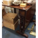 A mahogany drop leaf table.