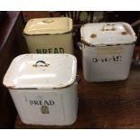 Three enamelled storage jars.