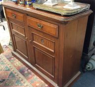 A mahogany two drawer sideboard.