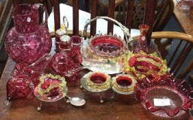 A collection of cranberry glass.