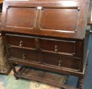 An oak barley twist bureau.