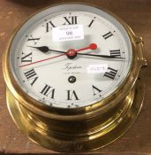 A brass mounted ships clock engraved Topsham.