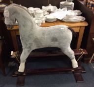 A large old rocking horse.