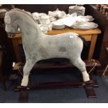 A large old rocking horse.