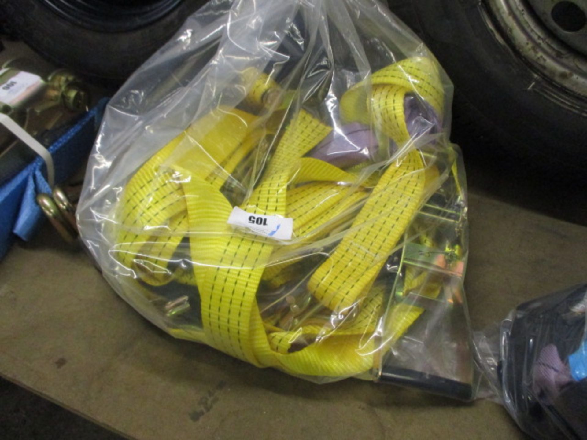 Bag of assorted lifting and ratchet tie down straps